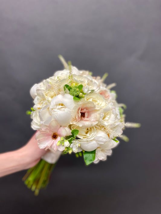 Bridal Bouquet with butterfly ranunculus and peonies