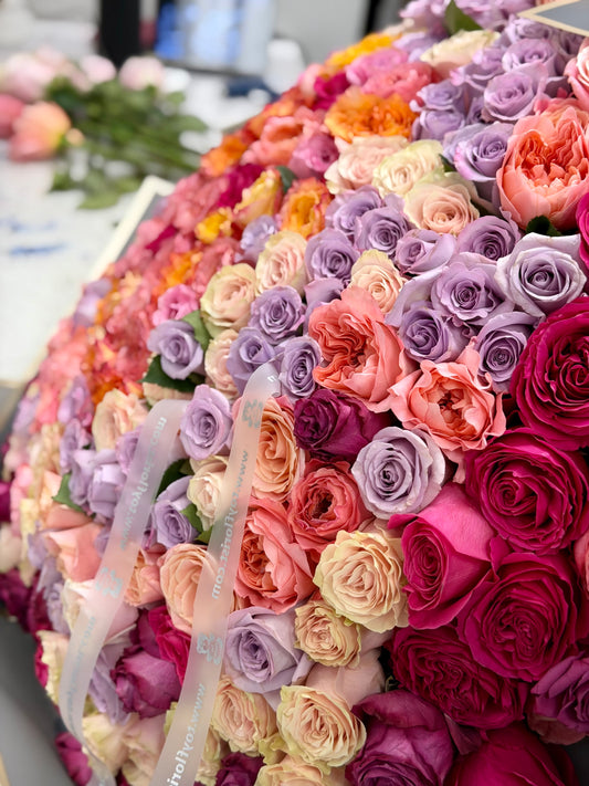 Large arrangement of colorful roses 365 roses