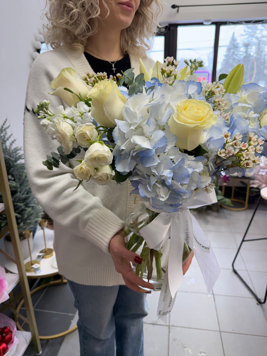 Vase arrangement pastel colour flowers