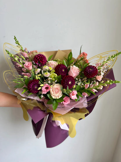 Bouquet of flowers with purple and pink tones 