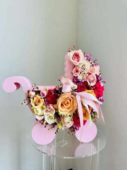 Floral Arrangement in a Stroller Shape Box for a Newborn